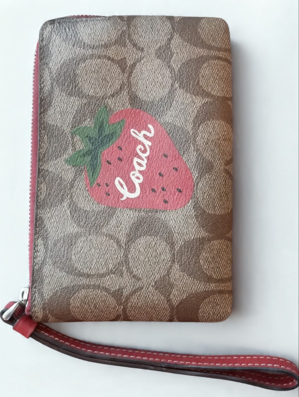 Coach Brown Signature Canvas Wristlet with Pink Strawberry Motif